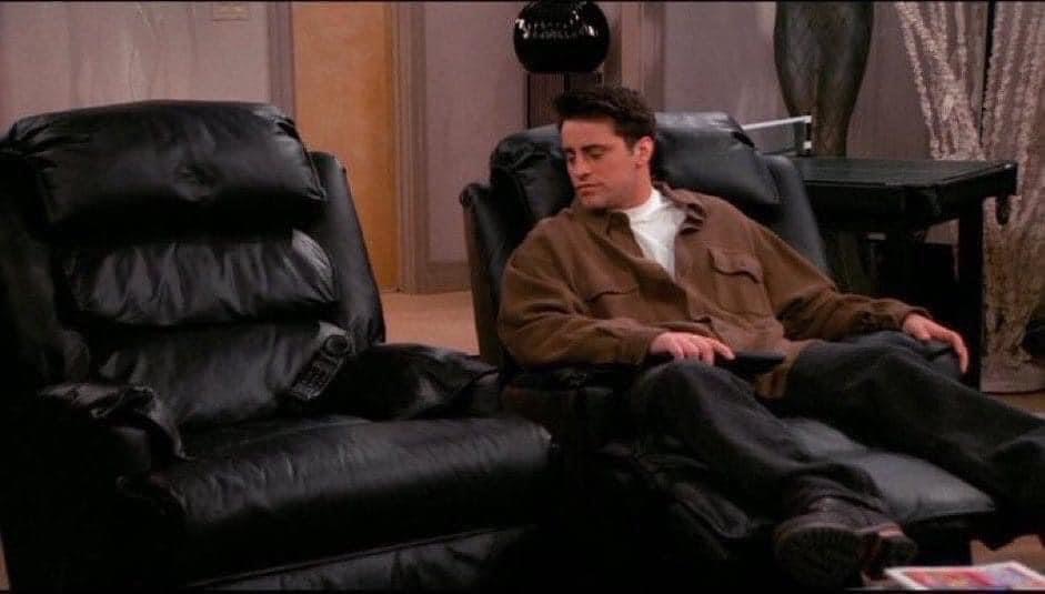 Matt LeBlanc in a recliner, empty recliner next to him.